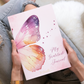 My Gratitude Journal with a butterfly design on the cover. Dr Samantha Worthington